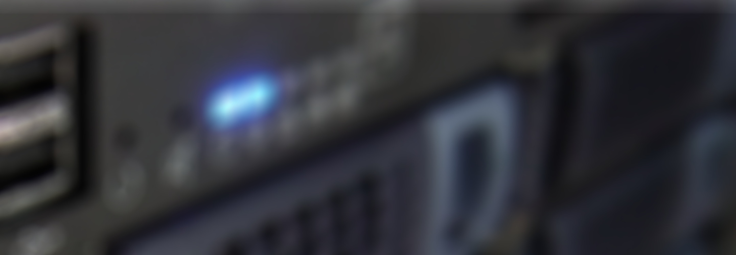 Fuzzy background image of audio hardware.